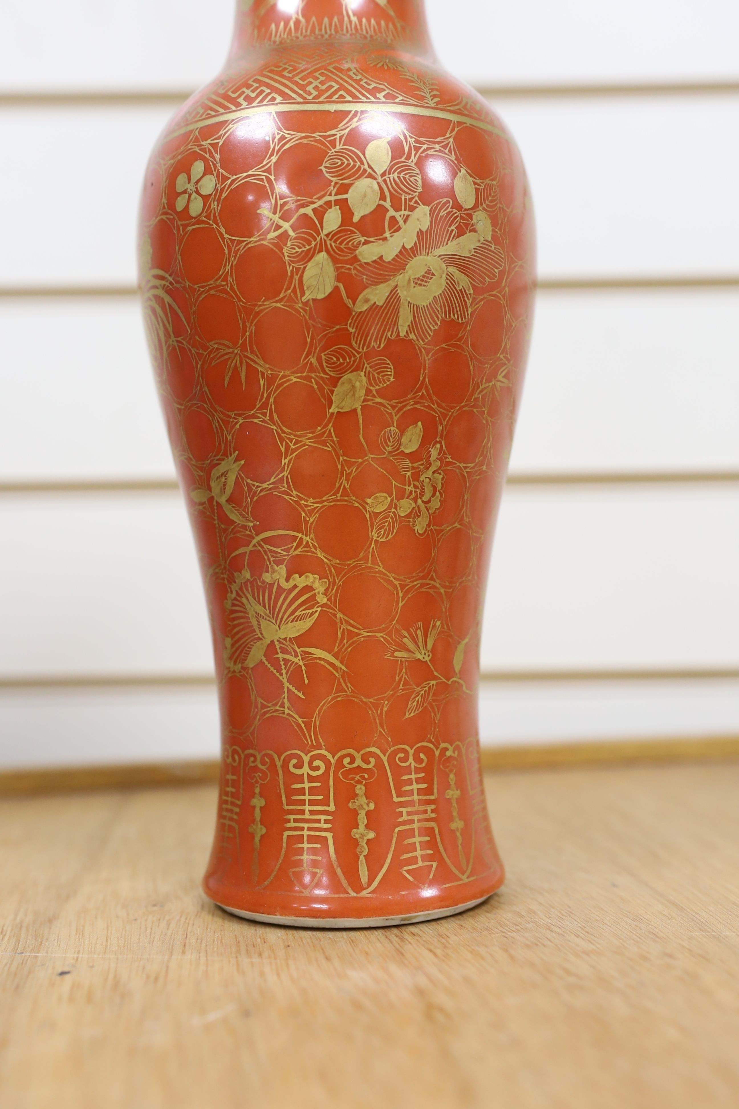 A Chinese blue and white gourd vase with landscape decoration, a similar blue and white sleeve vase and a Japanese Kutani vase